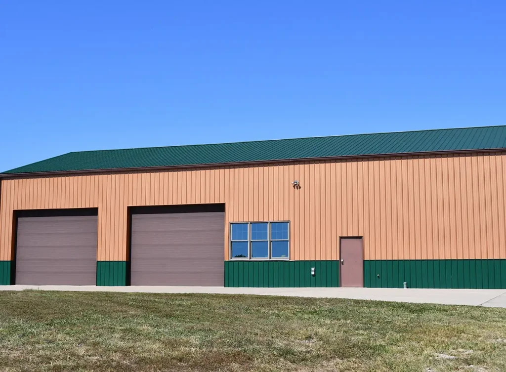 commercial warehouse building with metal roof installed by local metal roofing contractor near effingham illinois