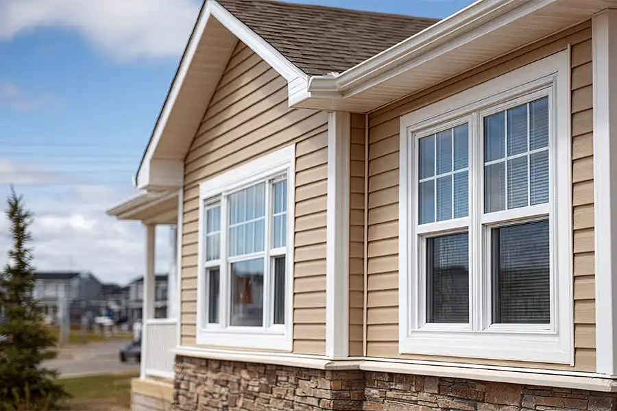 BAM Roofing & Construction—A close-up view of a modern residential home in Central IL, showcasing coordinated roofing and siding.